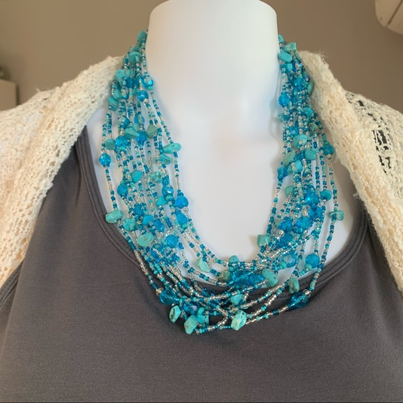 A pop of Turquoise in this beautiful, magnetic 12 strand of beads!! - Picture 2 of 4